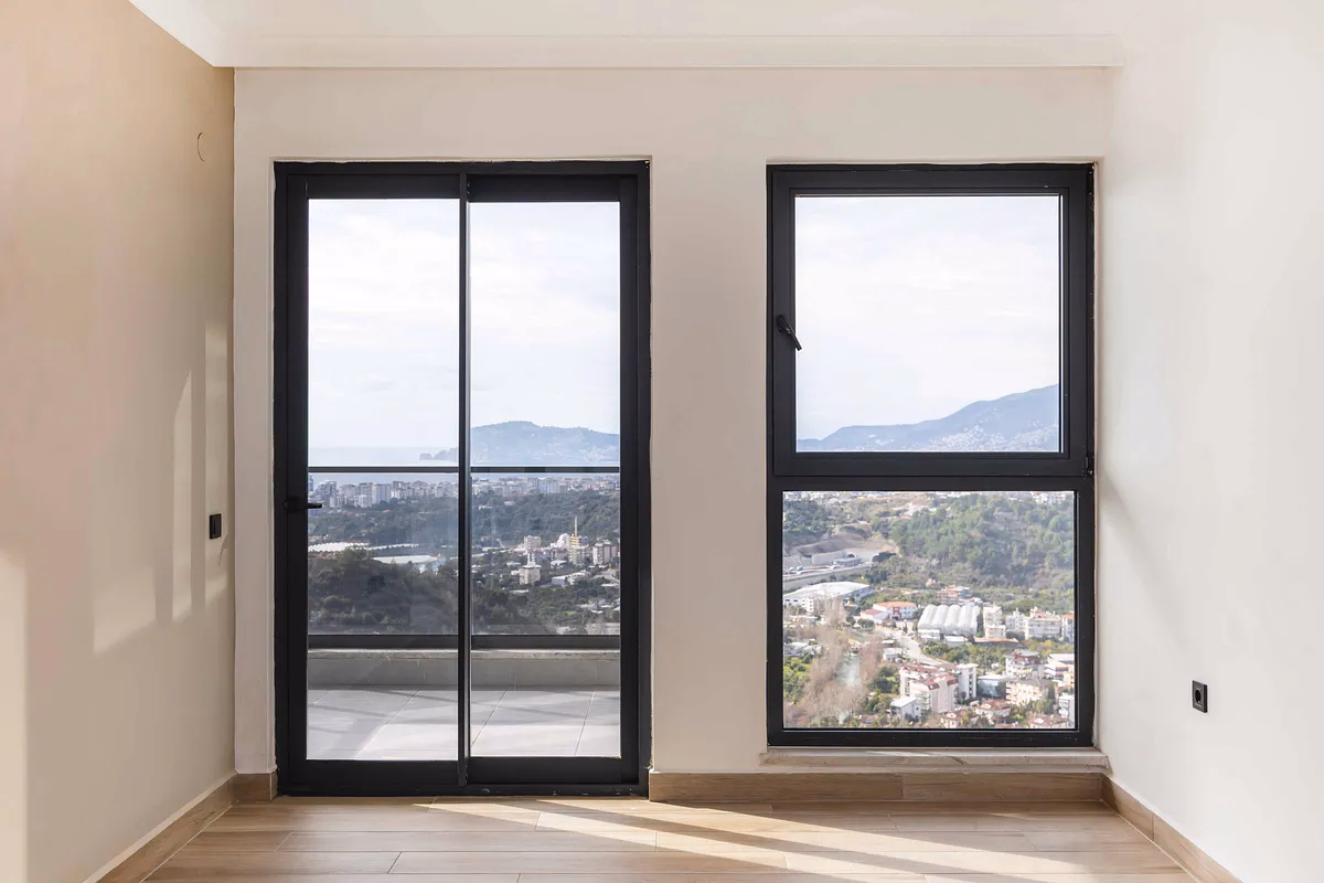 Buy Apartment Alanya – Küçüker Tower 1+1 Sea View Luxury (8) Modern living room Alanya 1+1 apartmen