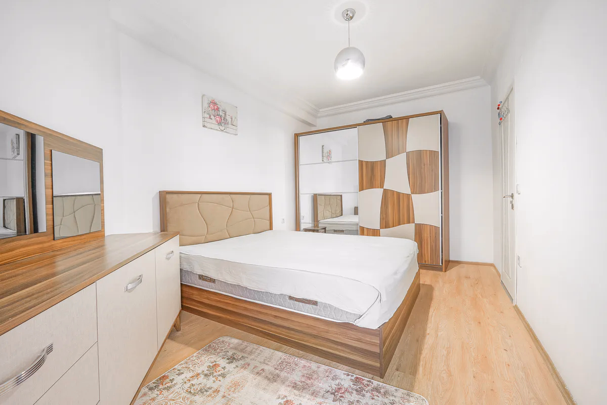 Buy Apartment Kestel Alanya — Furnished 1+1 in Doğanay Residence (10) Bright furnished bedroom in Doğanay Residence Alanya apartment