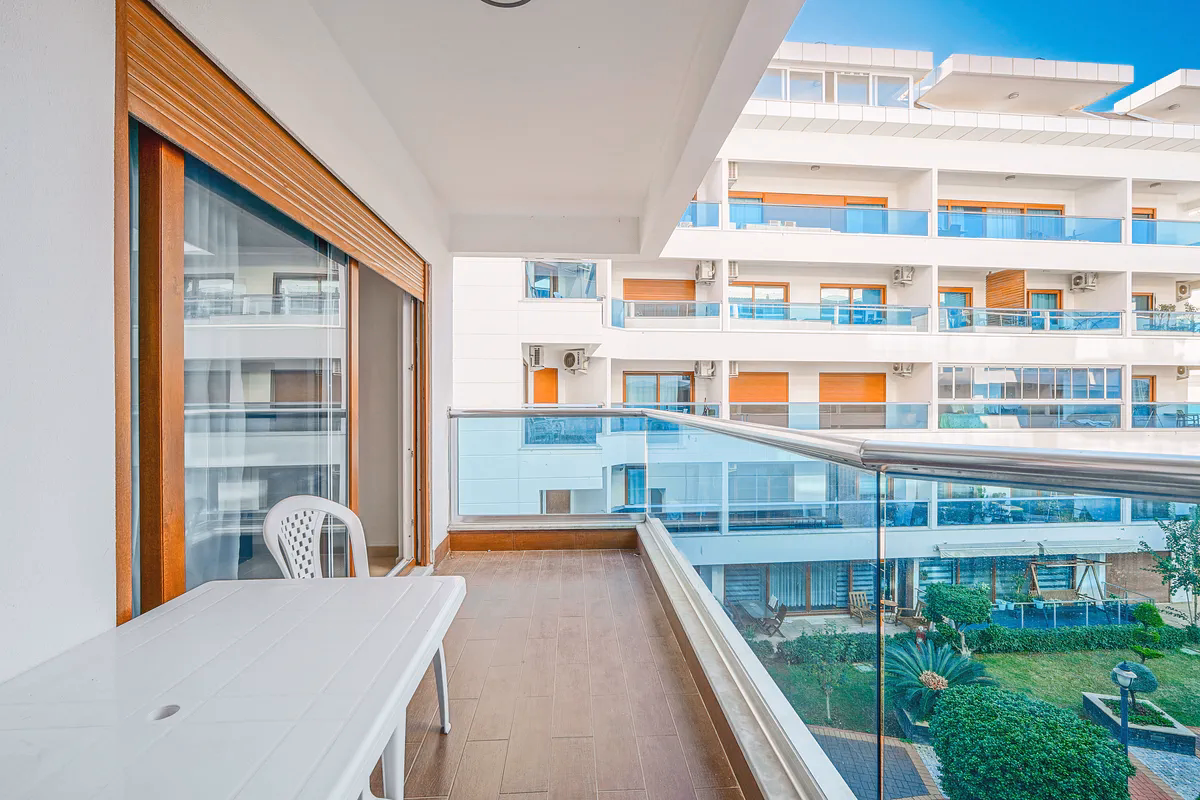 Buy Apartment Kestel Alanya — Furnished 1+1 in Doğanay Residence (12) Private balcony with outdoor views at Doğanay Residence Kestel