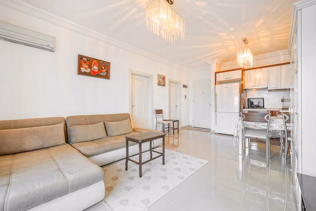 Buy Apartment Kestel Alanya — Furnished 1+1 in Doğanay Residence (13) Furnished open-plan living room in Doğanay Residence Kestel