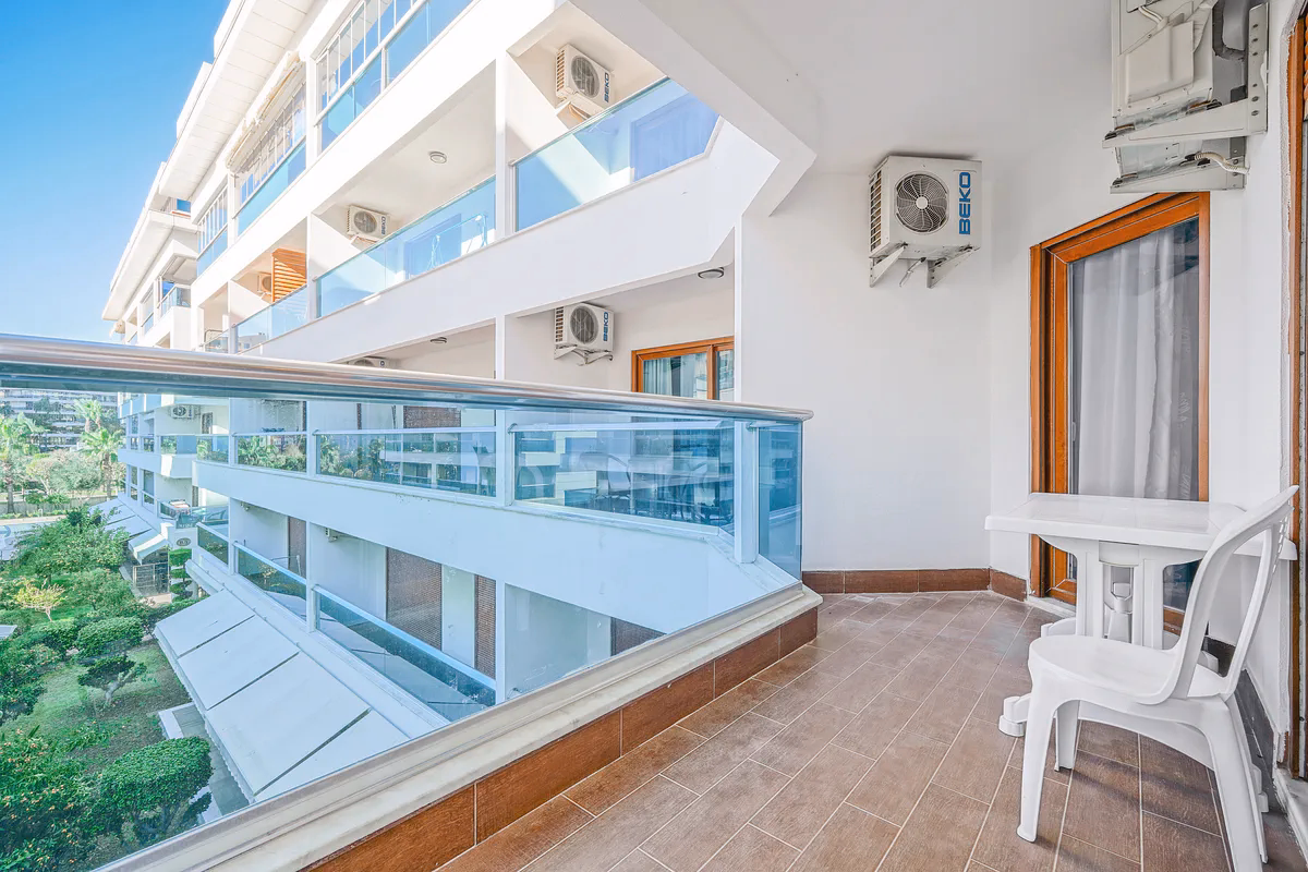 Buy Apartment Kestel Alanya — Furnished 1+1 in Doğanay Residence (14) Private balcony with outdoor views at Doğanay Residence Kestel