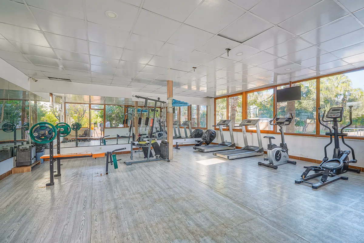Buy Apartment Kestel Alanya — Furnished 1+1 in Doğanay Residence (2) Fitness room inside Doğanay Residence residential complex Kestel