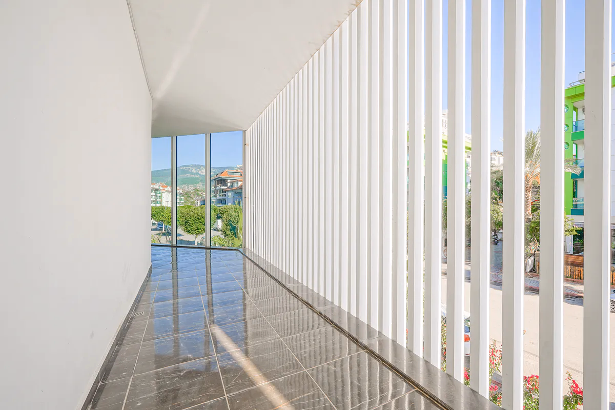Buy Apartment Kestel Alanya — Furnished 1+1 in Doğanay Residence (6) Private balcony with outdoor views at Doğanay Residence Kestel