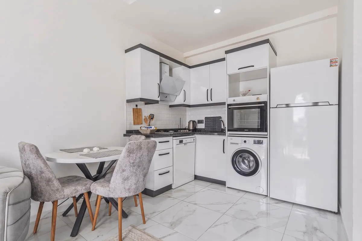 Buy Apartment Mahmutlar Alanya — Furnished 1+1 in Best Life 8 (7) Open American kitchen in furnished apartment Mahmutlar Alanya