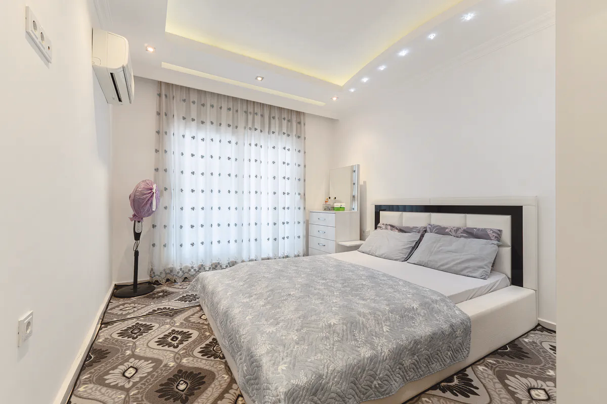 Buy Apartment Mahmutlar Alanya — Spacious 85 m² 1+1 in Hes Cebeci (13) Large furnished bedroom in Hes Cebeci apartment Mahmutlar