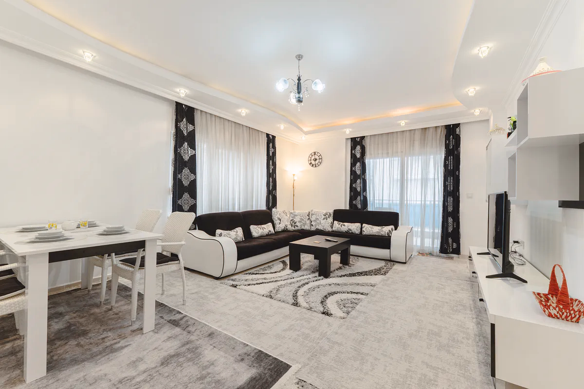 Buy Apartment Mahmutlar Alanya — Spacious 85 m² 1+1 in Hes Cebeci (2) Spacious furnished living room in Hes Cebeci Mahmutlar Alanya