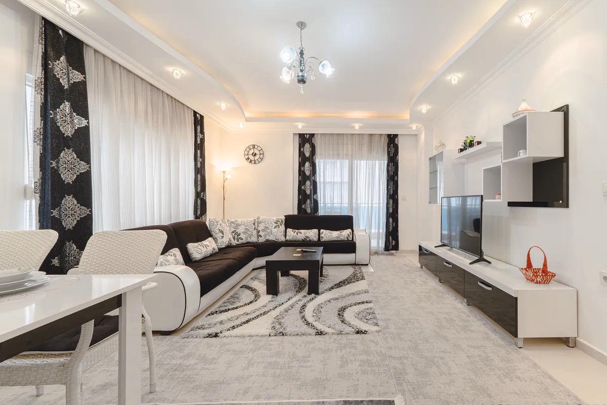 Buy Apartment Mahmutlar Alanya — Spacious 85 m² 1+1 in Hes Cebeci (3) Spacious furnished living room in Hes Cebeci Mahmutlar Alanya