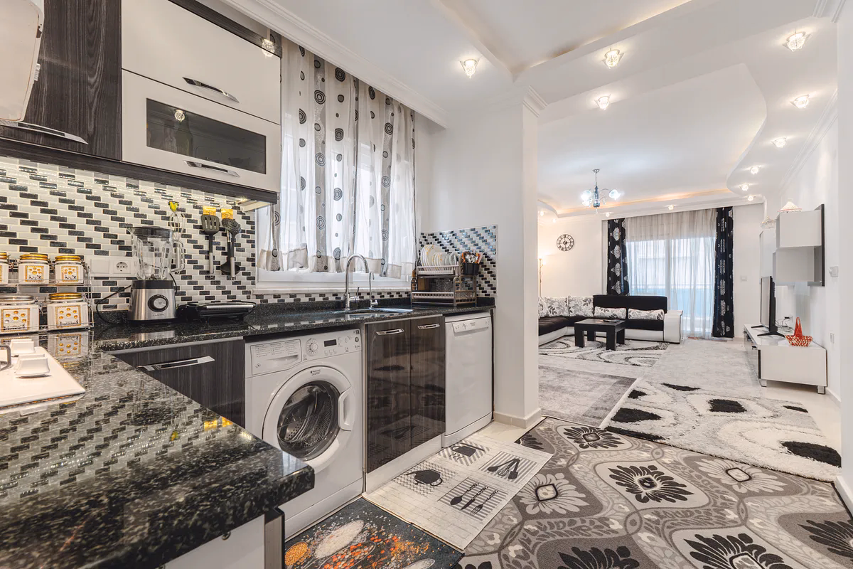 Buy Apartment Mahmutlar Alanya — Spacious 85 m² 1+1 in Hes Cebeci (6) American open kitchen in Hes Cebeci furnished apartment Mahmutlar