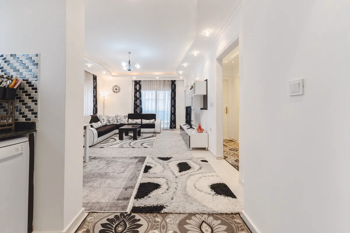 Buy Apartment Mahmutlar Alanya — Spacious 85 m² 1+1 in Hes Cebeci (7) Spacious furnished living room in Hes Cebeci Mahmutlar Alanya