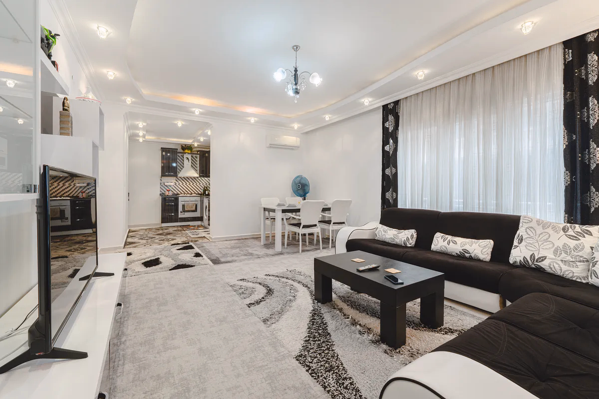 Buy Apartment Mahmutlar Alanya — Spacious 85 m² 1+1 in Hes Cebeci (8) Spacious furnished living room in Hes Cebeci Mahmutlar Alanya