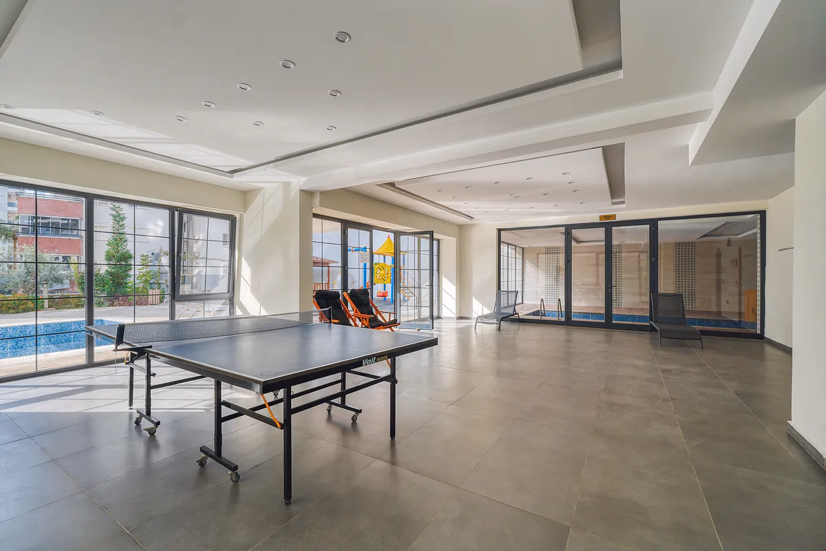 Buy Apartment Mahmutlar Alanya — Unfurnished 1+1 in Gökgür Palace (18) Children's playground area at Gökgür Palace Mahmutlar Alanya