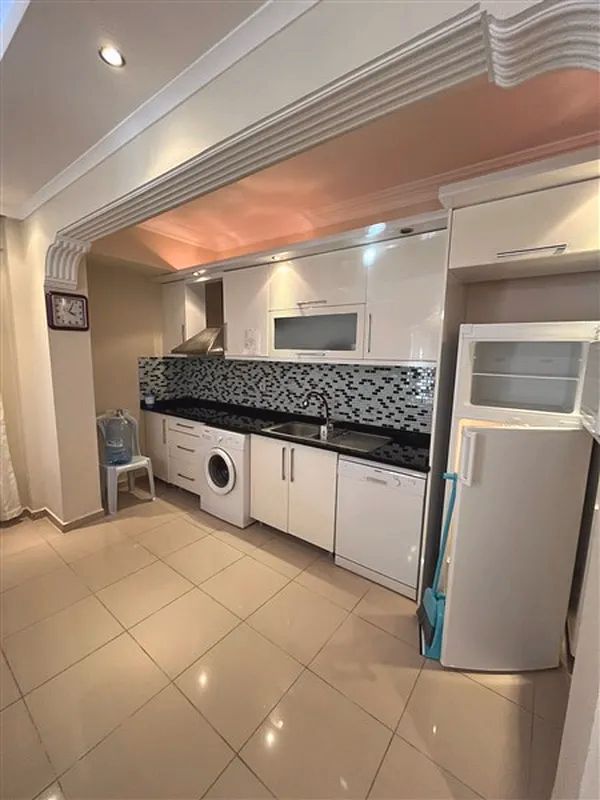 Buy Apartment in Alanya Turkey Furnished 2+1 Apartment in Oba Lake Residence (4) Fully equipped kitchen in Oba Lake Residence apartment