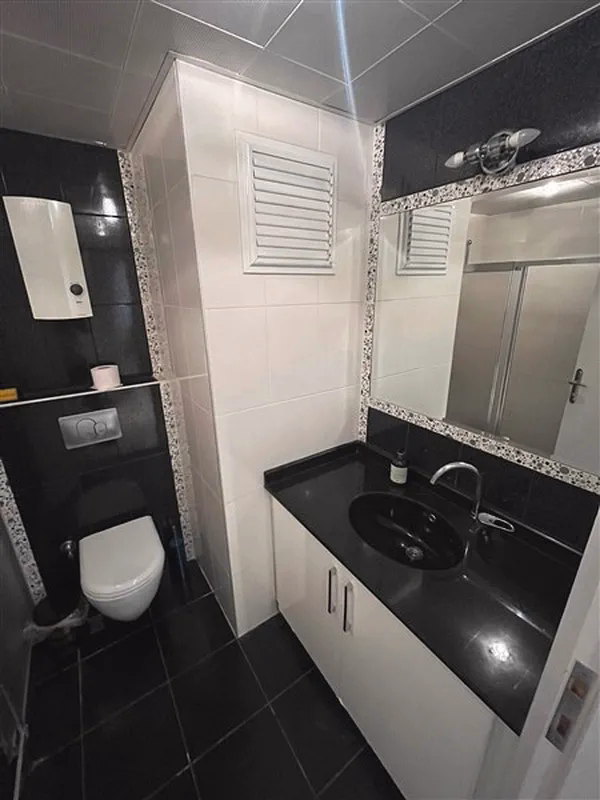 Buy Apartment in Alanya Turkey Furnished 2+1 Apartment in Oba Lake Residence (7) Modern bathroom in 2+1 apartment in Oba Alanya