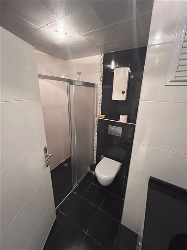 Buy Apartment in Alanya Turkey Furnished 2+1 Apartment in Oba Lake Residence (8) Modern bathroom in 2+1 apartment in Oba Alanya