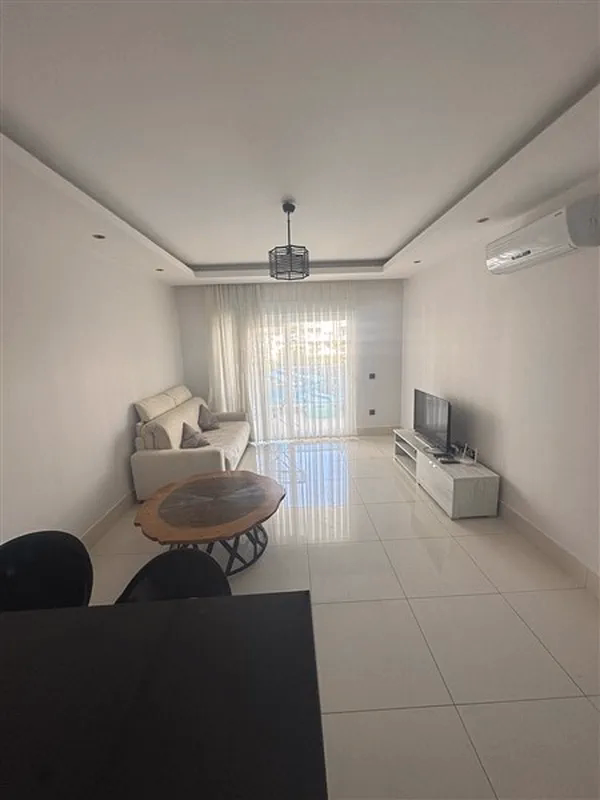 Buy Apartment in Alanya Turkey – Furnished 1+1 Apartment in Nordic Life Residence, Tosmur (16) Bright lounge area in Nordic Life Residence Tosmur