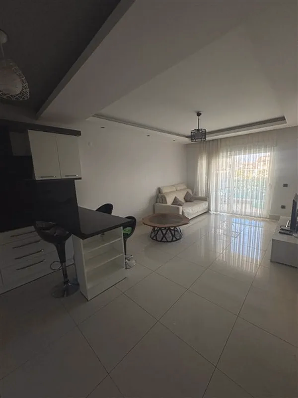 Buy Apartment in Alanya Turkey – Furnished 1+1 Apartment in Nordic Life Residence, Tosmur (25) Modern living room in furnished apartment Alanya Turkey