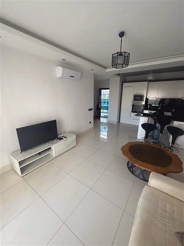 Buy Apartment in Alanya Turkey – Furnished 1+1 Apartment in Nordic Life Residence, Tosmur (26) Modern living room in furnished apartment Alanya Turkey
