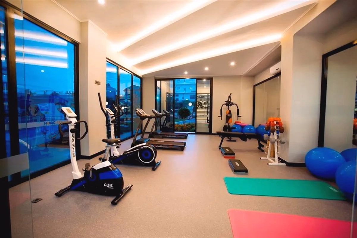 Buy Apartment in Alanya Turkey – Furnished 1+1 Apartment in Nordic Life Residence, Tosmur (9) Fitness center at Nordic Life Residence Tosmur