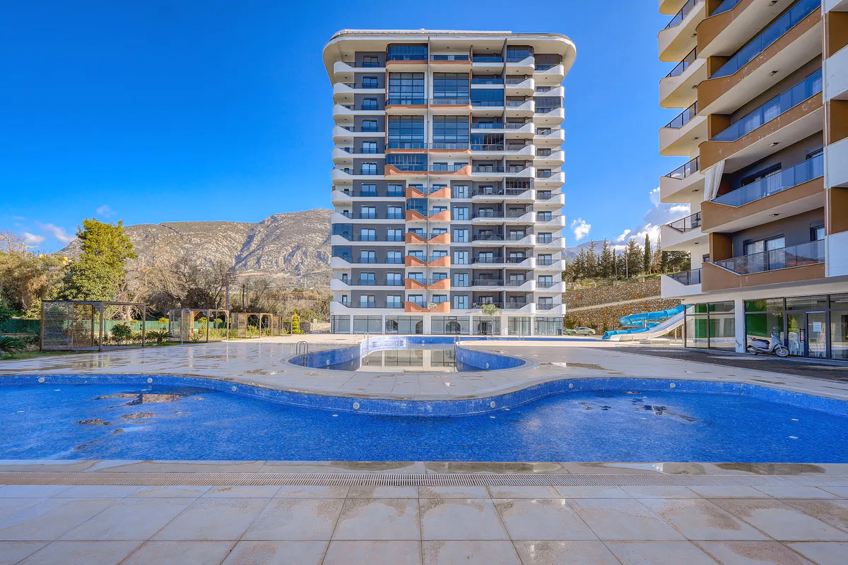 Discover a furnished studio apartment in Mahmutlar, Alanya (15) Outdoor swimming pool TNH Hill