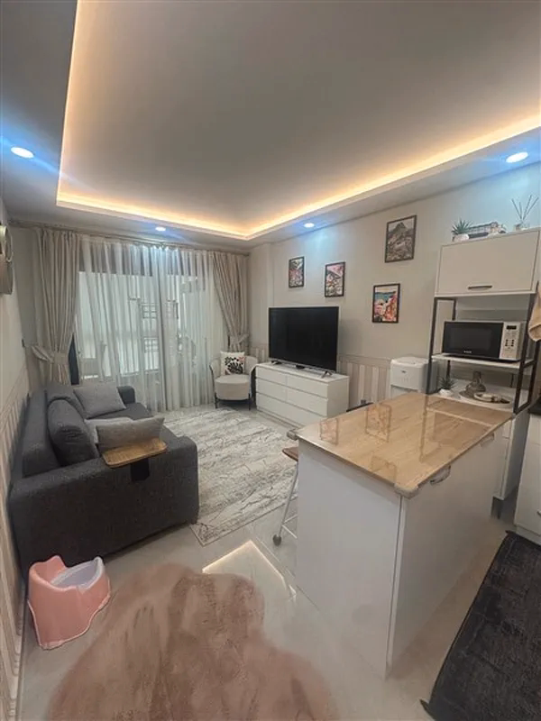 Furnished 1+1 Apartment in White Residence Oba (9) Modern living room in White Residence Oba Alanya apartment