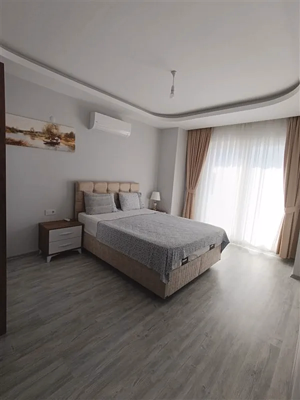 Furnished 2+1 Apartment in Mahmutlar (18) Guest bedroom in Family 2 Residence Mahmutlar apartment