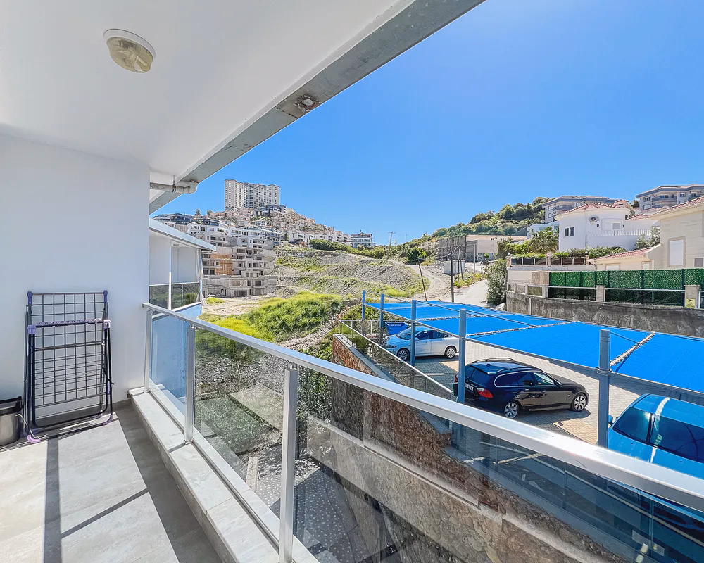 Modern Studio Apartment in STAY SUIT Residence, Kargicak (19) Balcony with sea and city views in Kargicak Alanya apartment