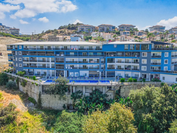 STAY SUIT furnished studio apartment for sale in Kargicak Alanya Turkey with sea and city views