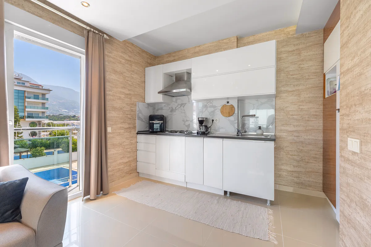 Nature-Friendly Studio Apartment for Sale in Kestel, Alanya (10) Modern furnished studio apartment interior in Kestel Alanya near the beach