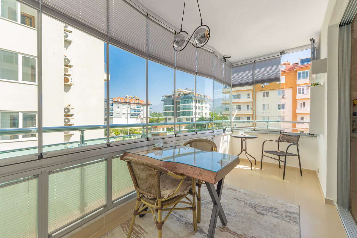 Nature-Friendly Studio Apartment for Sale in Kestel, Alanya (12) Balcony with sea and city views in Kestel Alanya studio apartment