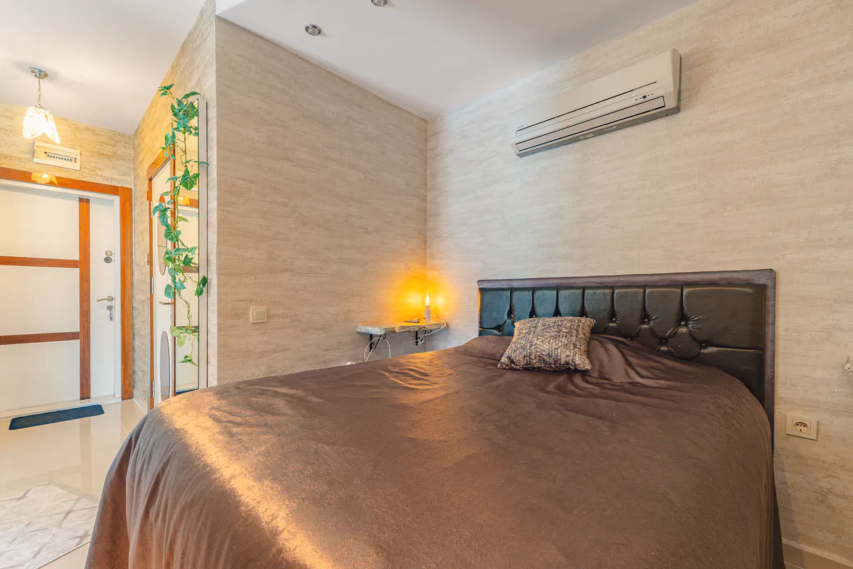 Nature-Friendly Studio Apartment for Sale in Kestel, Alanya (6) Modern Hilton bathroom with shower cabin in Kestel Alanya apartment