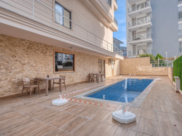 Outdoor swimming pool at Novita 11 complex Mahmutlar Alanya