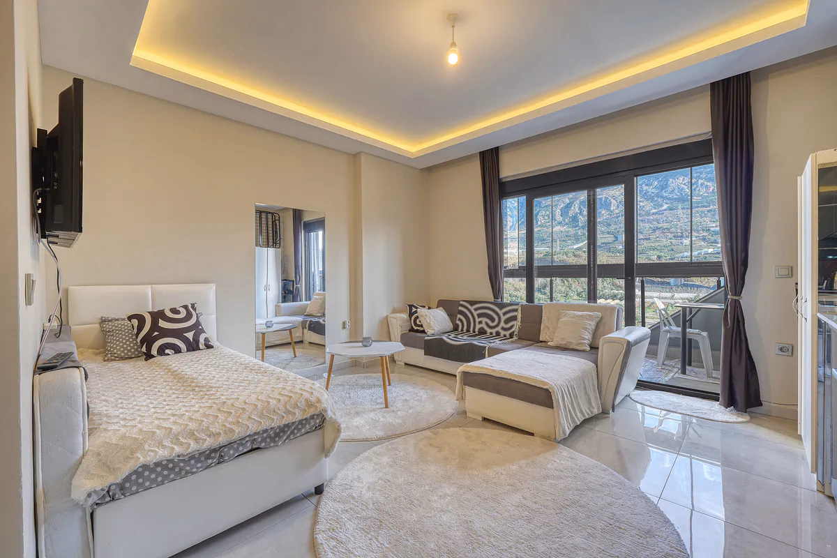 Studio Apartment Mahmutlar Alanya Furnished TNH Hill (2) Modern sleeping space in Mahmutlar apartment
