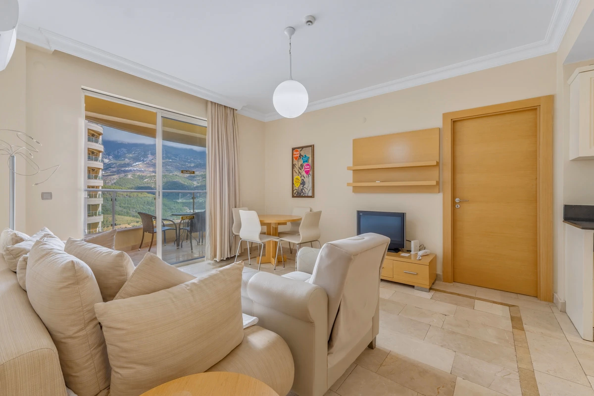 GoldCity Apartment Kargicak – Panoramic Sea Views (1) Furnished living room at GoldCity Kargicak