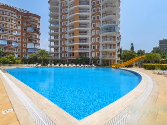 Outdoor swimming pool at Orange Garden Tosmur